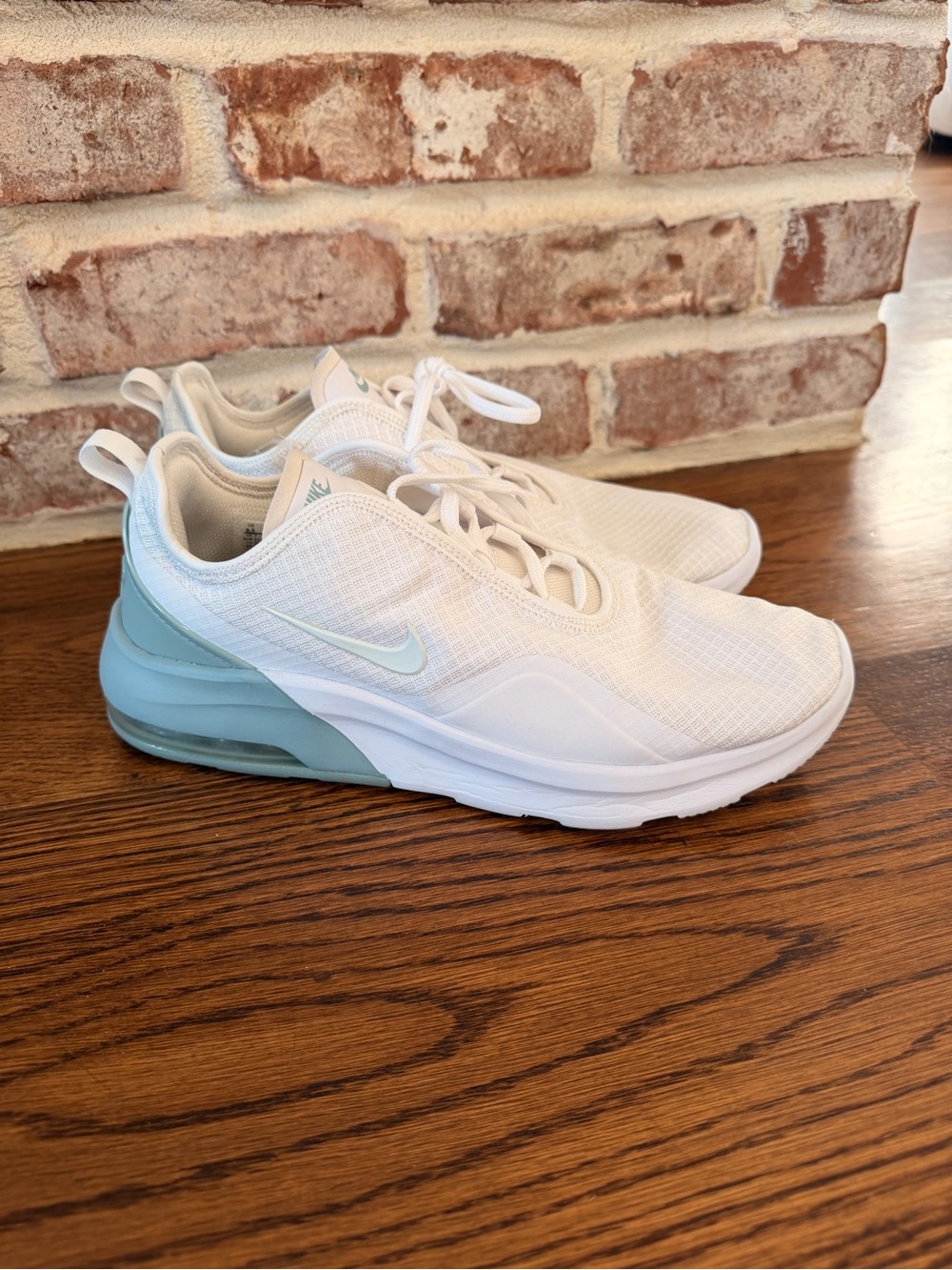 Nike White Sneakers with Light Teal Heel Accents
